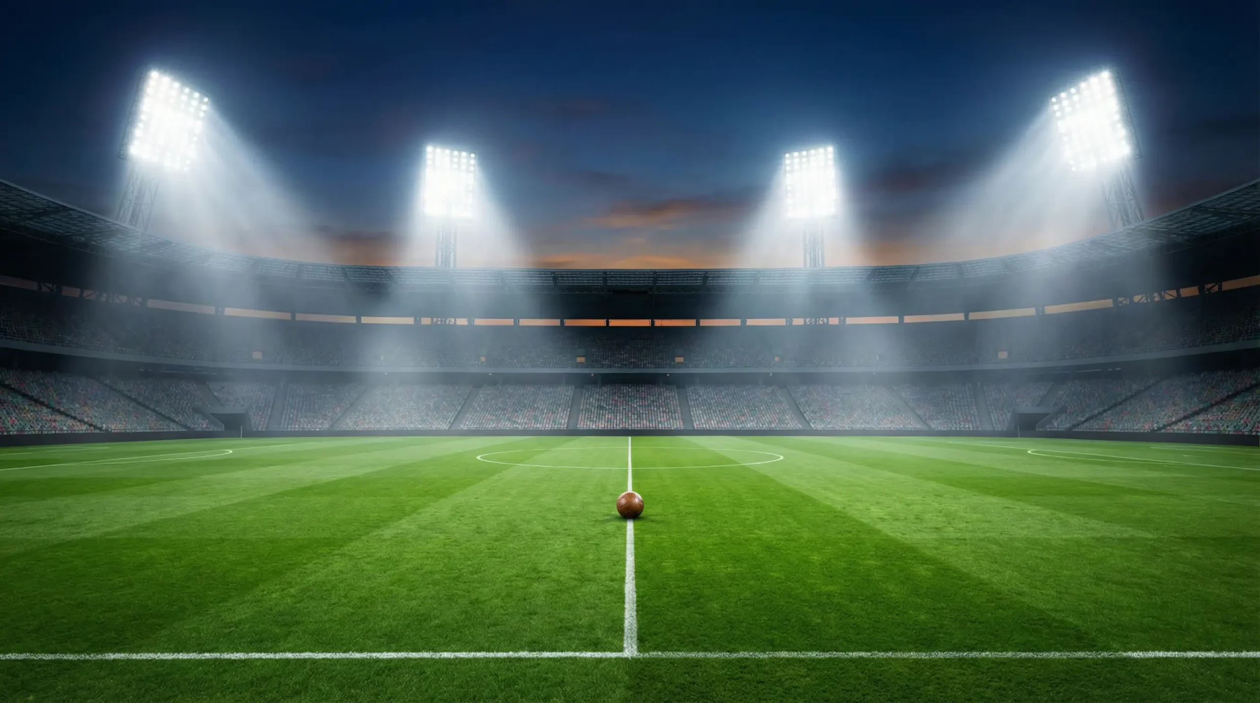 Fußballstadion mit Flutlicht und Rasen kurz vor dem Anpfiff eines WM-Spiels